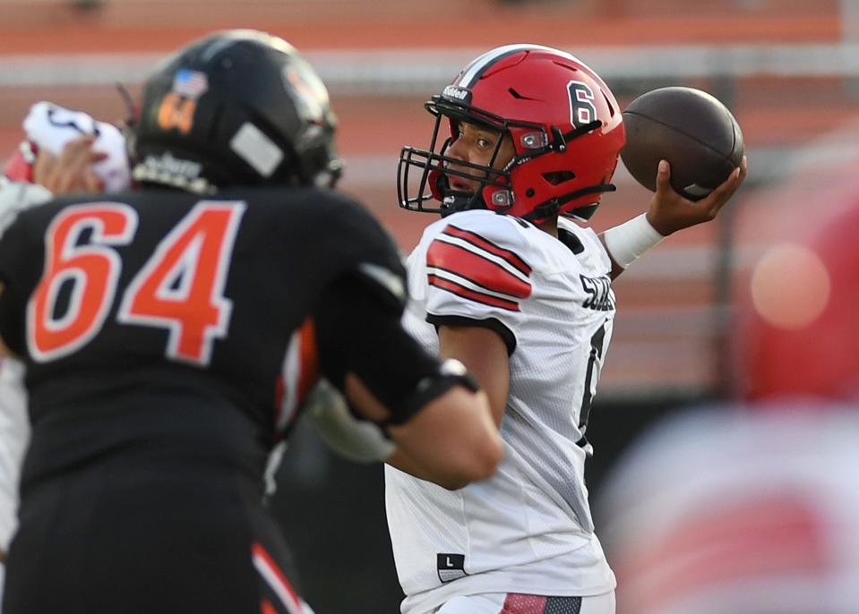 Des Moines East's quarterback JeCari Patton (6) will be showcasing his ability at six camps this summer.