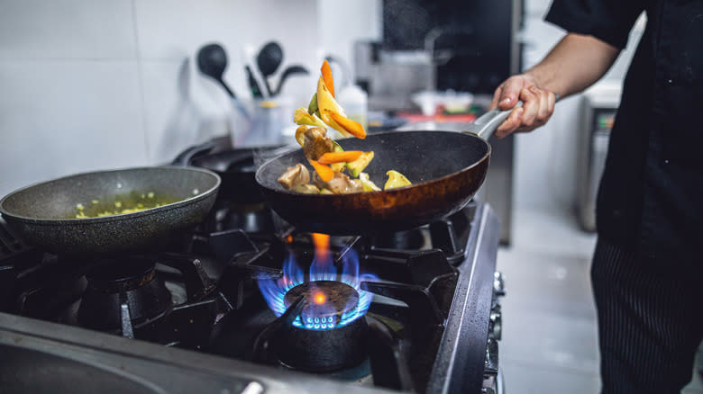 Preparing food on gas stove