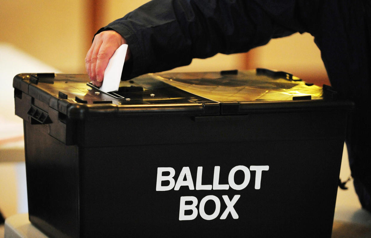 File photo dated 06/05/10 of a voter placing a ballot paper in the ballot box. Voters in Northern Ireland go to the polls on Thursday amid political impasse over Brexit and efforts to defrost the institutions at Stormont.