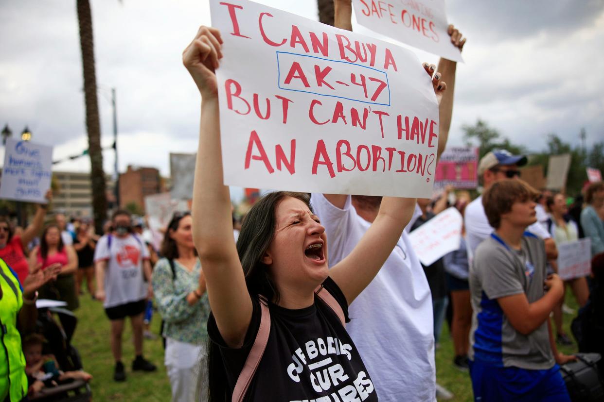 Arabella Carns yells during a protest in June 2022 in downtown Jacksonville. Hundreds came out after the Supreme Court's 5-4 decision overturning Roe v. Wade.