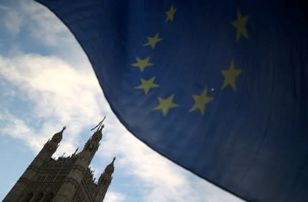 An EU flag flutters during an anti-Brexit demonstration outside the Houses of Parliament in London