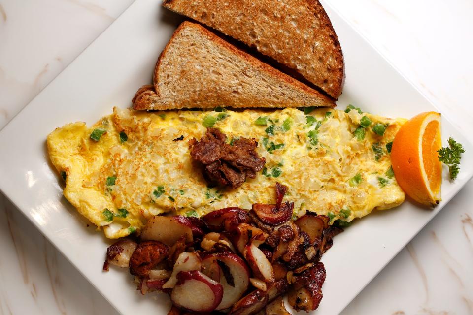 The Cheese Steak Omelet with steak, green pepper, onion, and white American cheese is a customer favorite at KeKe's Breakfast Cafe, which recently opened at 12959 Atlantic Blvd. in Jacksonville's East Arlington neighborhood.