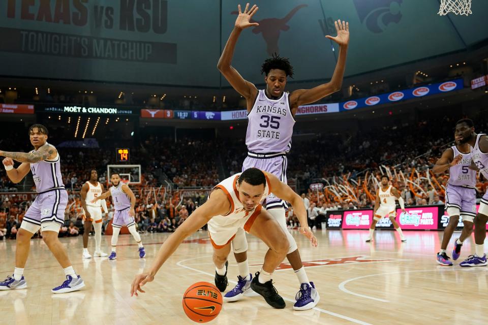 Texas forward Dylan Disu tries to save the ball from going out of bounds during the Longhorns' 116-103 loss to Kansas State on Tuesday night at Moody Center. The Longhorns have struggled defensively over their last few games.