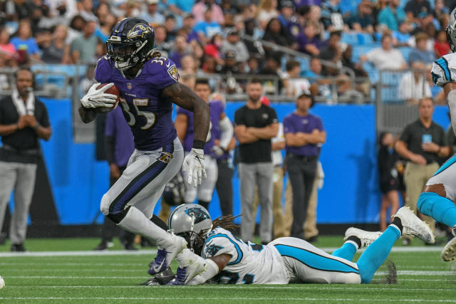 Baltimore Ravens running back Gus Edwards runs with the ball during News  Photo - Getty Images