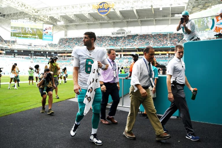 Jay Cutler of the Miami Dolphins leaves the field injured during the third quarter against the New York Jets, at Hard Rock Stadium in Miami Gardens, Florida, on October 22, 2017