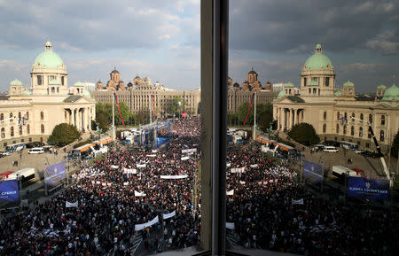 Supporters of Serbian President Aleksandar Vucic attend his campaign rally "The Future of Serbia" in front of the Parliament Building in Belgrade, Serbia, April 19, 2019. REUTERS/Marko Djurica