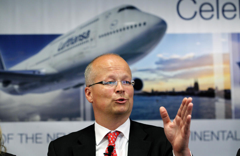 Lufthansa executive vice president Nico Buchholz speaks at a news conference before delivery by Boeing of the first 747-8 Intercontinental Tuesday, May 1, 2012, in Everett, Wash. Lufthansa is the launch customer for the Intercontinental and will start service with the airplane between Frankfurt, Germany and Washington, D.C. The 747-8 Intercontinental is a stretched, updated version of the iconic 747 and is expected to bring double-digit improvements in fuel burn and emissions over its predecessor, the 747-400, and generate 30 percent less noise. Boeing delivered the first 747-8 Intercontinental to a private customer in February, more than a year after originally planned. (AP Photo/Elaine Thompson)