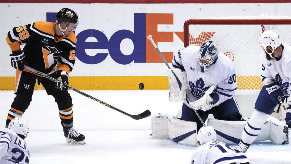 Toronto Maple Leafs goaltender Matt Murray (30) blocks a shot by Pittsburgh Penguins' Jake Guentzel (59) during the third period of an NHL hockey game in Pittsburgh, Tuesday, Nov. 15, 2022. The Maple Leafs won 5-2. (AP Photo/Gene J. Puskar)