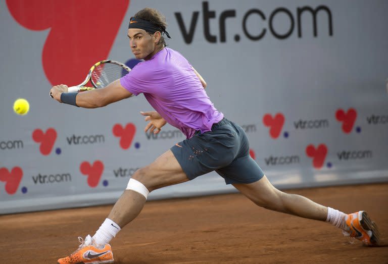 Rafael Nadal hits a return to Horacio Zeballos during the ATP Vina del Mar tournament final match, in Vina del Mar, about 120 km northwest of Santiago, on February 10, 2013. Zeballos won 6-7 (2/6), 7-6 (8/6), 6-4