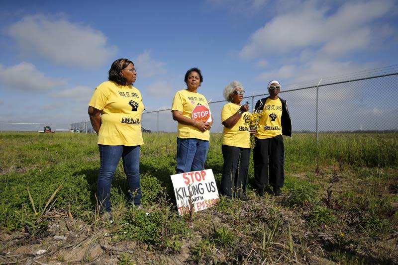 FILE – In this March 11, 2020, file photo, Sharon Lavigne, founder of environmental justice group Rise St. James, is second from the left as she and members Myrtle Felton, Gail LeBoeuf and Rita Cooper, speak against plans for a $9.4 billion chemical complex near Donaldsonville, La. Lavigne will receive what the University of Notre Dame describes as the oldest and most prestigious honor for American Catholics at the school’s commencement ceremonies May 15, 2022, in South Bend, Indiana.. (AP Photo/Gerald Herbert, File)