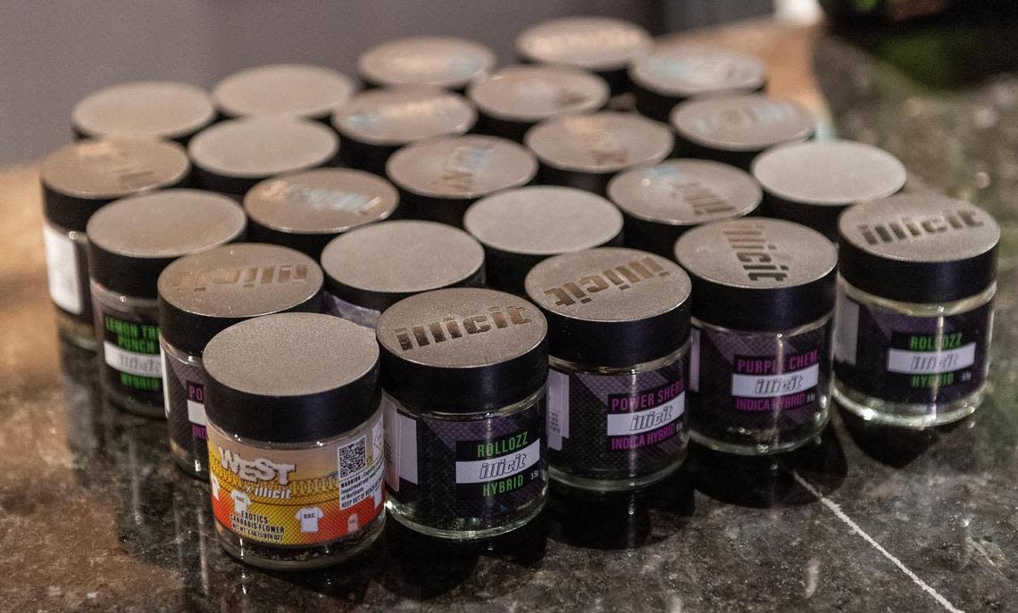 Three ounces of marijuana is illustrated by 24 jars containing 3.5 grams of flower at Fresh Green Dispensary on Friday, Feb. 3, 2023, in Kansas City.