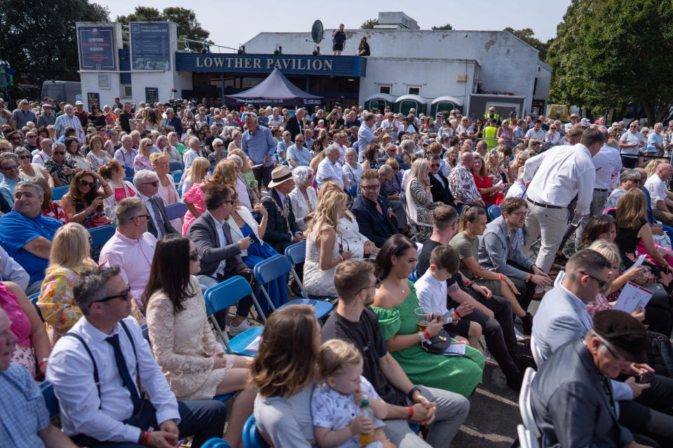 Crowds turned out to see the huge statue unveiled. (SWNS)