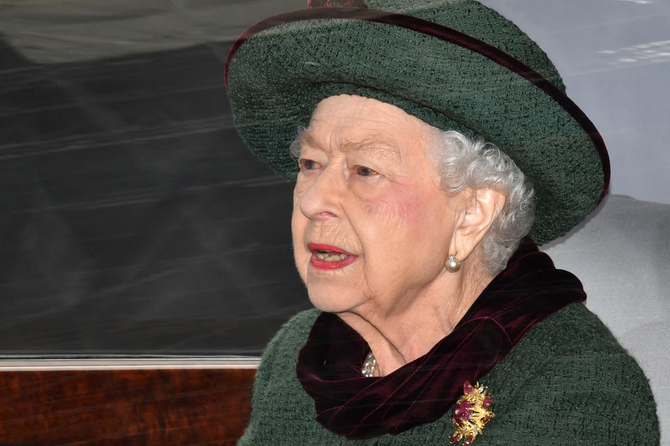 TOPSHOT - Britain's Queen Elizabeth II leaves after attending a Service of Thanksgiving for Britain's Prince Philip, Duke of Edinburgh, at Westminster Abbey in central London on March 29, 2022. - A thanksgiving service will take place on Tuesday for Queen Elizabeth II's late husband, Prince Philip, nearly a year after his death and funeral held under coronavirus restrictions. Philip, who was married to the queen for 73 years, died on April 9 last year aged 99, following a month-long stay in hospital with a heart complaint. (Photo by JUSTIN TALLIS / AFP) (Photo by JUSTIN TALLIS/AFP via Getty Images)