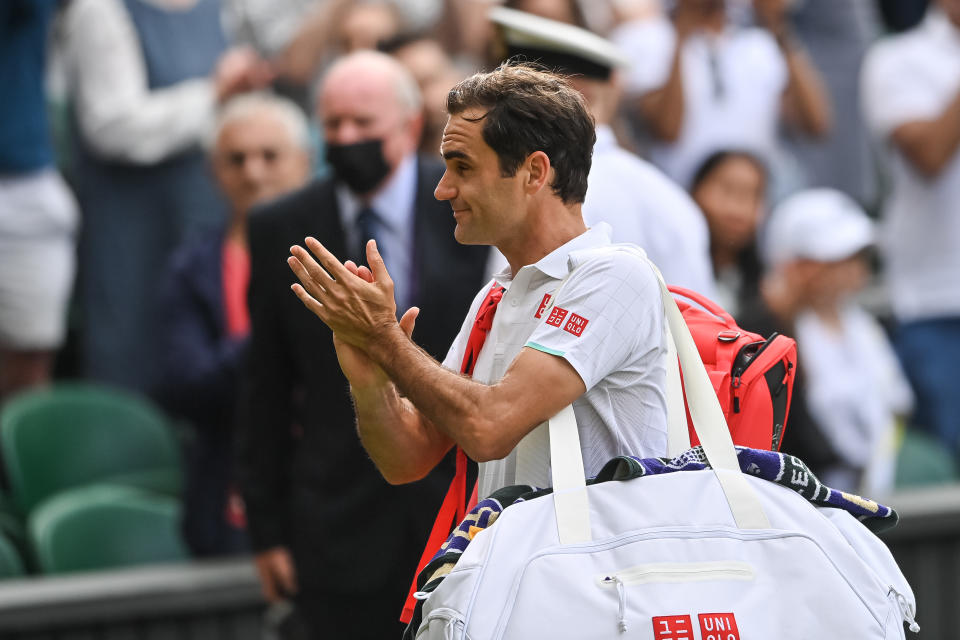 Seen here, Roger Federer thanks fans after leaving Centre Court at Wimbledon.