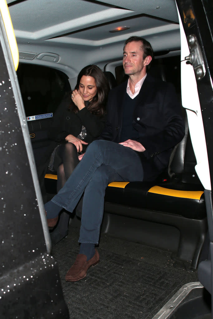 Pippa Middleton and James Matthews in a taxi at Princess Beatrice's engagement party at Chiltern Firehouse on 18 December 2019 in London. 