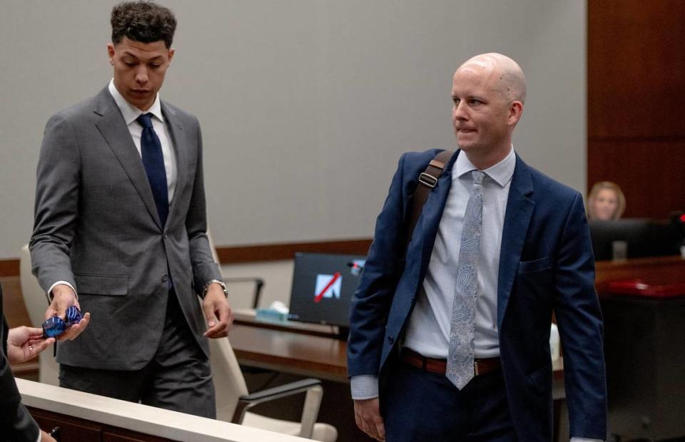 Jackson Mahomes and his attorney, Brandan Davies, leave the courtroom following a bond motion hearing in Johnson County District Court on Tuesday, May 16, 2023, in Olathe.