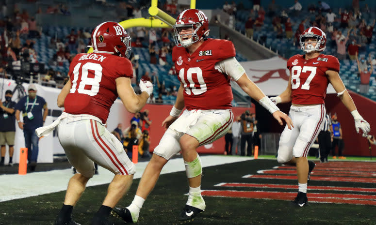 Mac Jones celebrates a touchdown.