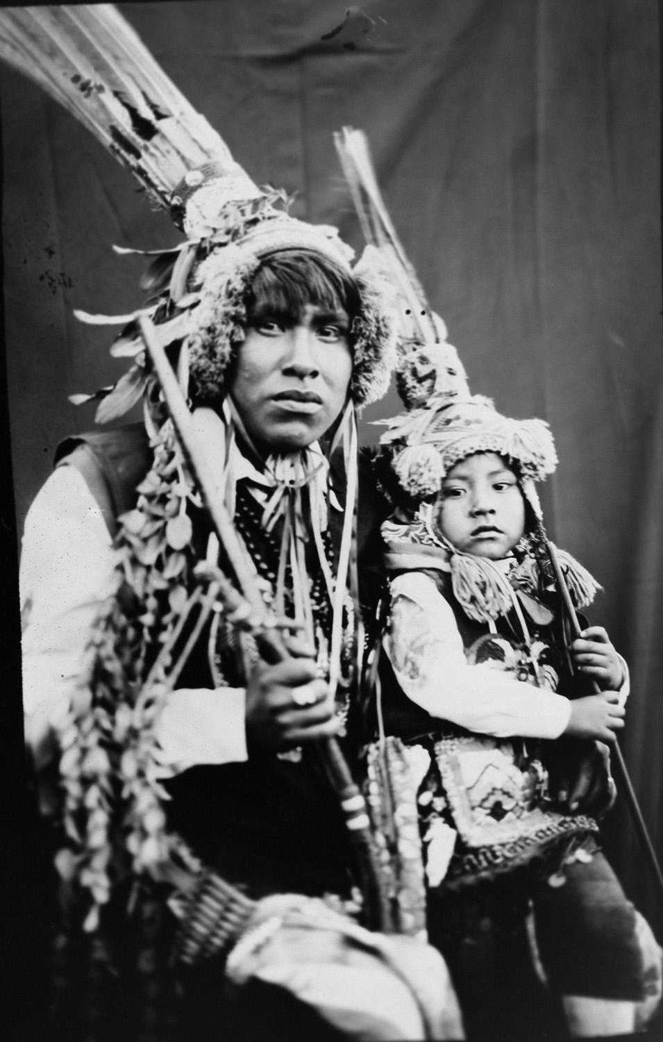 <p>Rudy Espiriya and his 3-year-old son, Dayiro Tahuara, pose for a portrait in the Sinakara Valley, in Peru’s Cuzco region, during the Qoyllur Rit’i festival, translated from the Quechua language as Snow Star. Espiriya and his son perform a dance called Paapuri Guayri as part of the Paucartambo nation. (Photo: Rodrigo Abd/AP) </p>