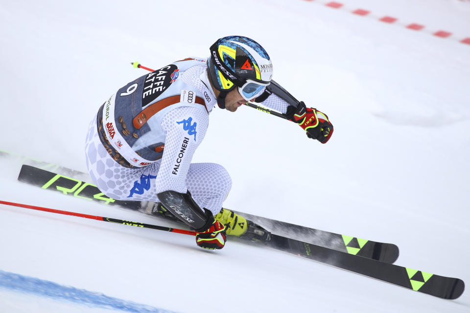 Italy's Manfred Moelgg speeds down the course during a men's World Cup Giant Slalom, in Alta Badia, Italy, Sunday, Dec. 16, 2018. (AP Photo/Alessandro Trovati)