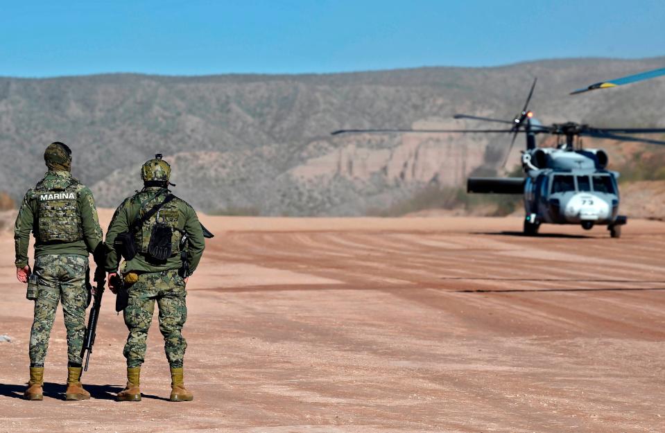 Members of the Mexican Navy are seen upon the landing of an Air Force helicopter at La Mora ranch, in Bavispe, Sonora state, Mexico, on January 11, 2020.   (AFP via Getty Images)