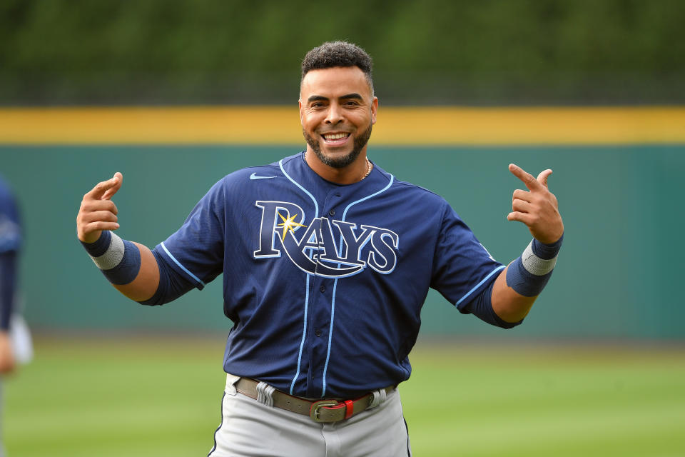 CLEVELAND, OHIO - JULY 23: Nelson Cruz #23 of the Tampa Bay Rays celebrates prior to the game against the Cleveland Indians at Progressive Field on July 23, 2021 in Cleveland, Ohio. (Photo by Jason Miller/Getty Images)