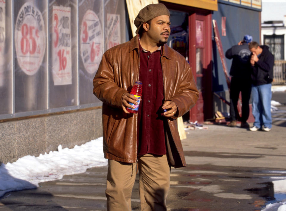 Ice Cube holding a drink.