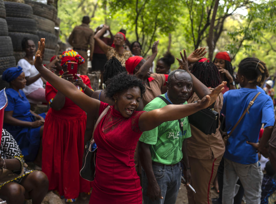 FILE - Believers dance during the St. George vodou celebration in Port-au-Prince, Haiti, Wednesday, April 24, 2024. While spirits infuse believers with energy and hope, Vodou priests warn they don’t perform miracles. (AP Photo/Ramon Espinosa, File)