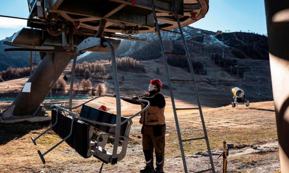 A chairlift is examined during maintenance checks in Sestriere.