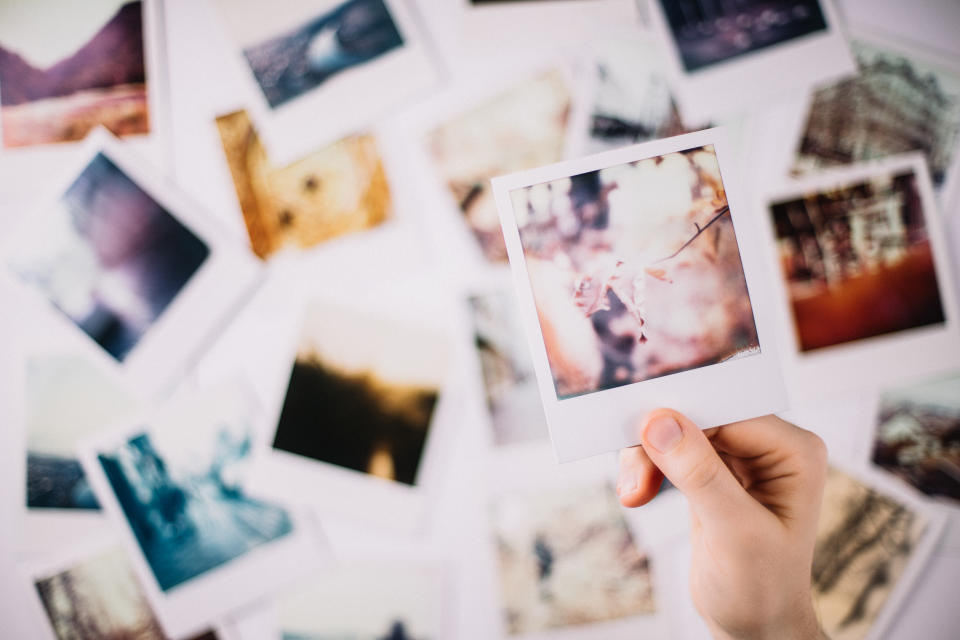 Say cheese! Get your hands on a Polaroid to shoot memories you can keep. Photo: Getty