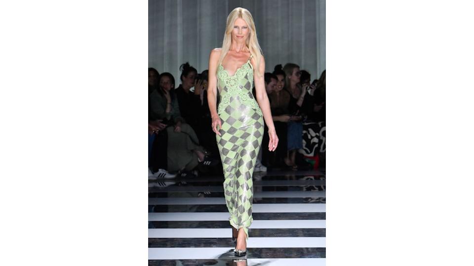 Claudia Schiffer walks the runway during the Versace Ready to Wear Spring/Summer 2024 fashion show as part of the Milan Fashion Week 