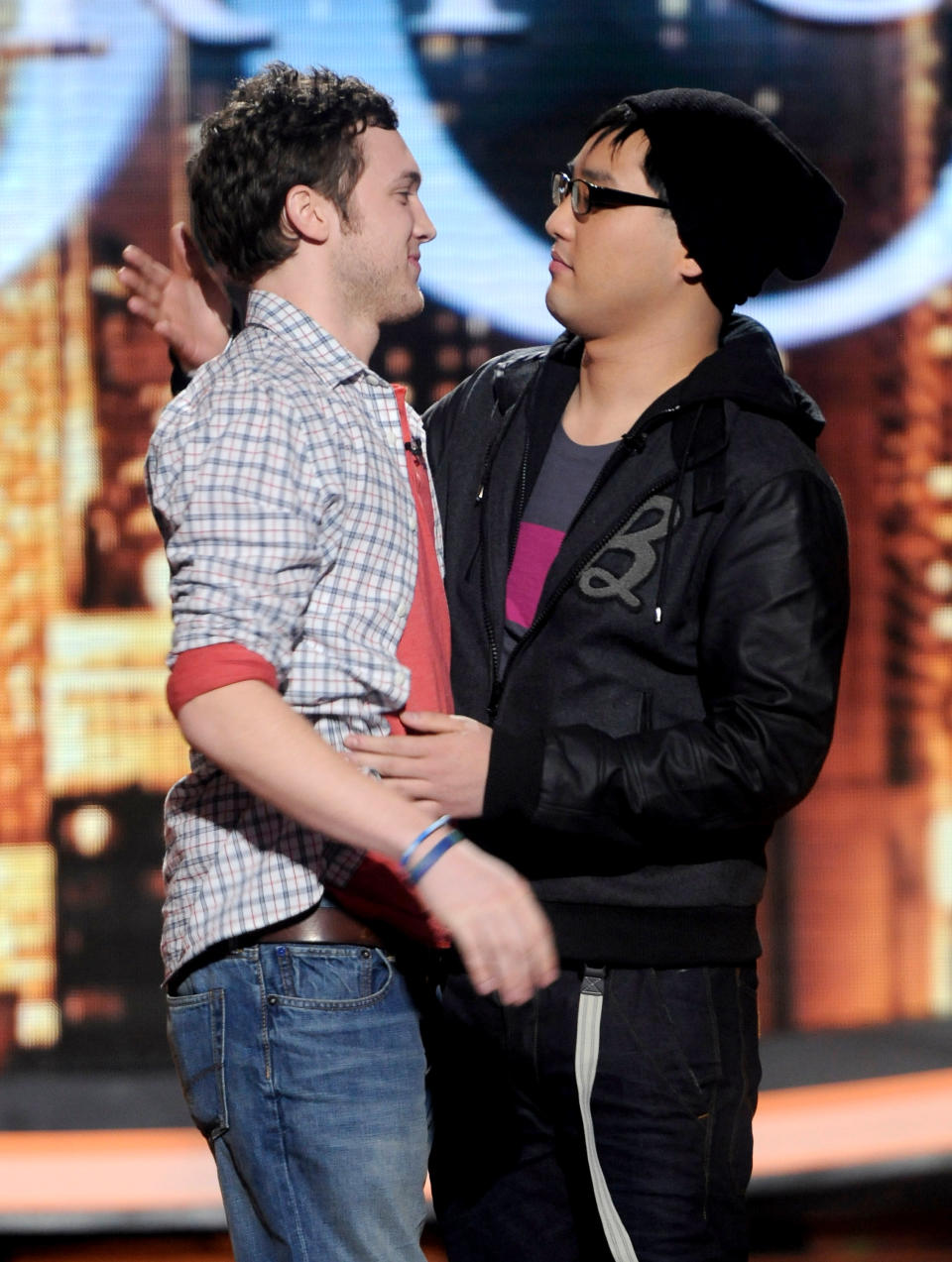 (L-R) Contestants Phillip Phillips and Heejun Han onstage at FOX's 'American Idol' Season 11 Top 10 To 9 Live Elimination Show on March 22, 2012 in Hollywood, California. (Photo by FOX via Getty Images)