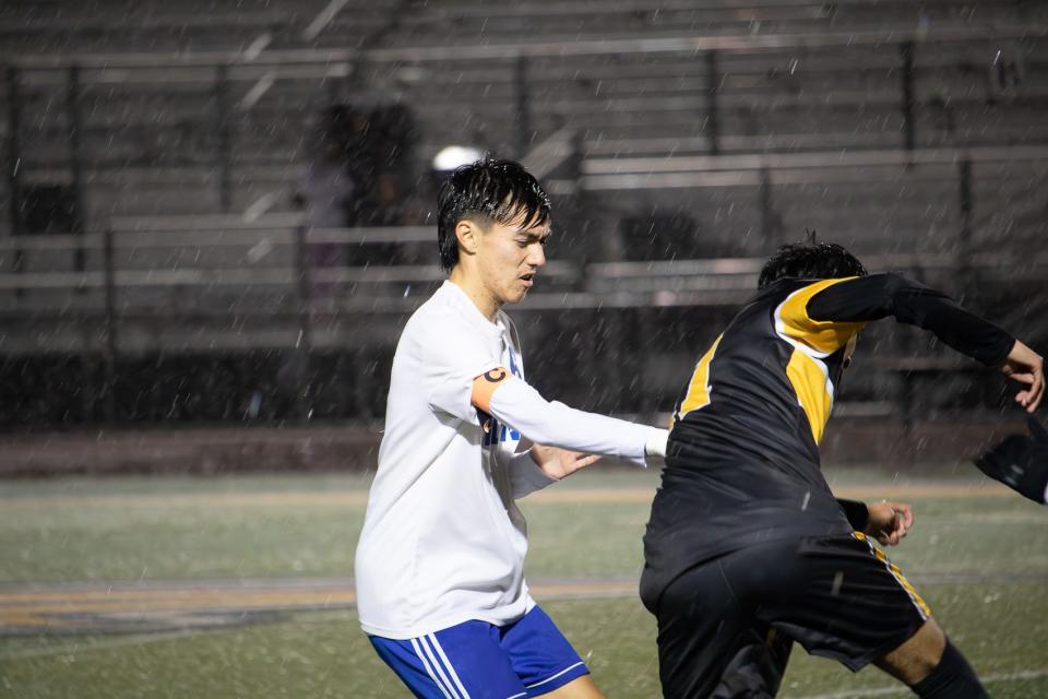 Linden's Mario Rodriguez fights for the ball with a Stagg player during the Lions game against Stagg on Feb. 5, 2023 at Stagg High School.