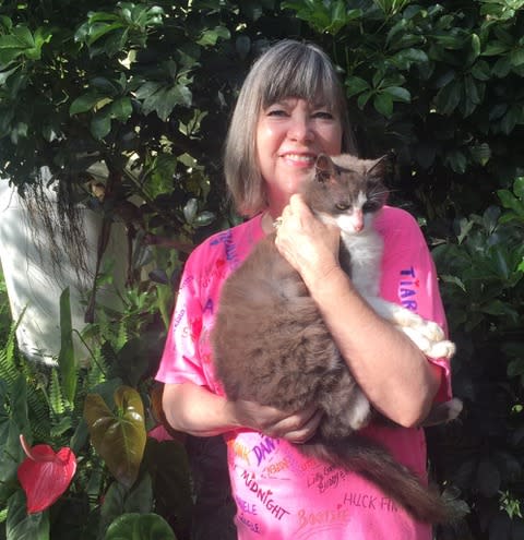 Kathy Carroll with her pet cat Toulouse