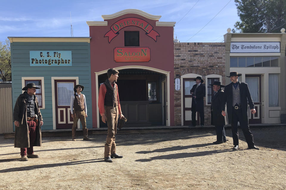 Actors are seen reenacting the events that led to an 1881 shootout in the town that left three dead and became one of the most famous gun battles in the Old West on Saturday, Nov. 20, 2019 in Tombstone, Ariz. Numerous books and movies have been based on the shootout. Tombstone was founded and flourished in the late 19th century after large amounts of silver were found in the area. (AP Photo/Peter Prengaman)