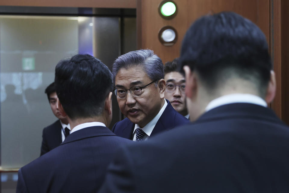 South Korean Foreign Minister Park Jin, center, leaves after a briefing announcing a plan on Monday to resolve a dispute over compensating people forced to work under Japan's 1910-1945 occupation of Korea, at the Foreign Ministry in Seoul, South Korea Monday, March 6, 2023. South Korea on Monday announced a contentious plan to raise local civilian funds to compensate Koreans who won damages in lawsuits against Japanese companies that enslaved them during World War II. (Kim Hong-Ji/Pool Photo via AP)