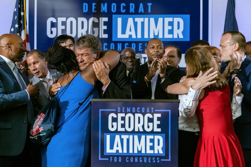 Westchester County Executive George Latimer embraces a supporter at his election night party in White Plains, N.Y., Tuesday, June 25, 2024. The race between Bowman and Latimer had a fair share of controversy and contention. | Jeenah Moon