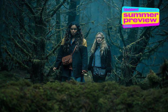 <p>Warner Bros. Pictures</p> Georgina Campbell and Dakota Fanning in 'The Watchers'