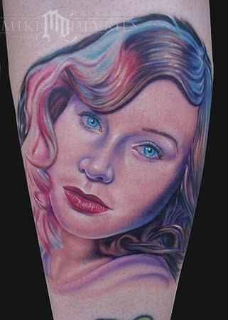 <div class="caption-credit"> Photo by: Mike Devries/mdtattoos.com</div>This Tori Amos tattoo would look great with an eyebrow ring and some store-bought angel wings. Had I known tattoos went beyond tribal arm cuffs in the '90s, this would have been a photo of my limb.