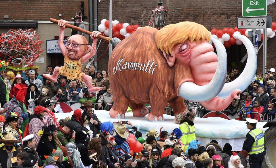 <p>A Carnival float depicting German chancellor Angela Merkel as mammoth and chancellor candidate Martin Schulz of the the Social Democrats participates at the traditional Carnival parade in Duesseldorf, Germany, on Monday, Feb. 27, 2017. (AP Photo/Martin Meissner) </p>