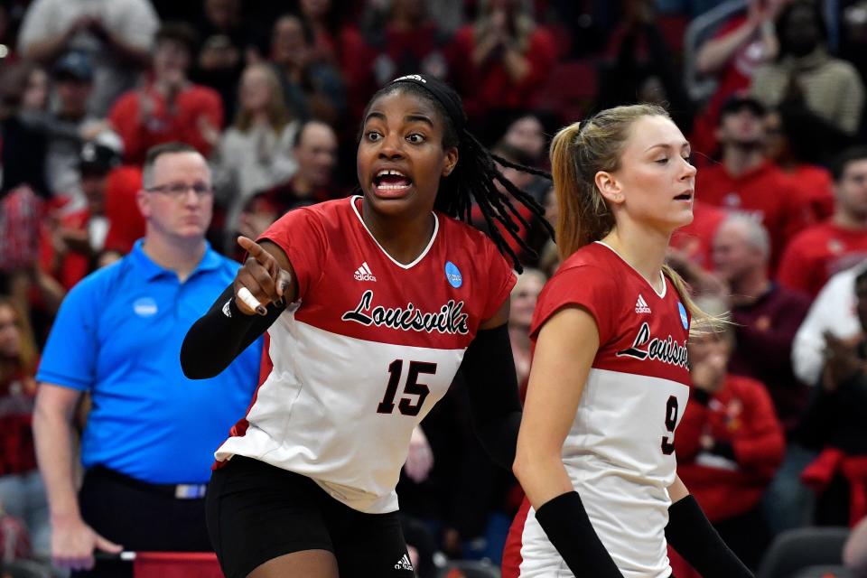 Louisville's Aiko Jones (15) talks to her teammates during their NCAA Regional Final game, Saturday, Dec. 10 2022 in Louisville Ky. Louisville defeated Oregon and will advance to the Final Four.