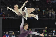 Evgenia Tarasova and Vladimir Morozov, of Russia, perform during the pairs short program at the Skate America figure skating event Friday, Oct. 22, 2021, in Las Vegas. (AP Photo/David Becker)