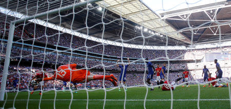 FILE PHOTO: FA Cup Final - Chelsea vs Manchester United - Wembley Stadium, London, Britain - May 19, 2018 Manchester United's Alexis Sanchez scores a disallowed goal from a rebound after Chelsea's Thibaut Courtois saves a header REUTERS/Andrew Yates/File Photo