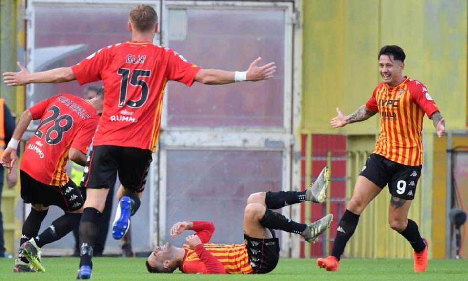 Roberto Insigne (centre) celebrates opening the scoring for Benevento.