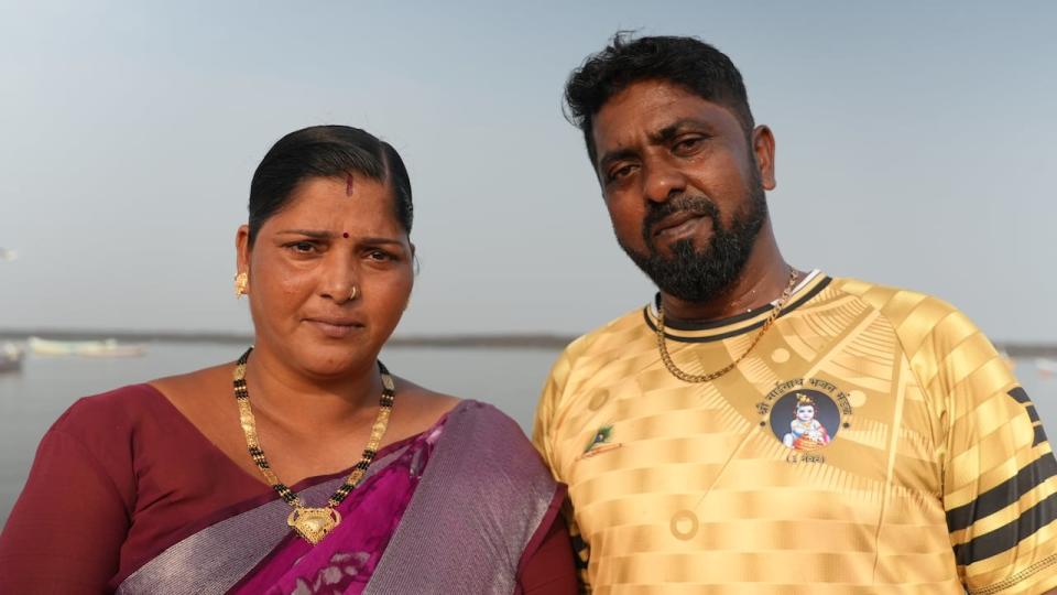 Rajeshwari Koli, left, and her husband Dinesh lost both of their boats when Cyclone Tauktae hit Mumbai in May 2021. She still has nightmares about it. 