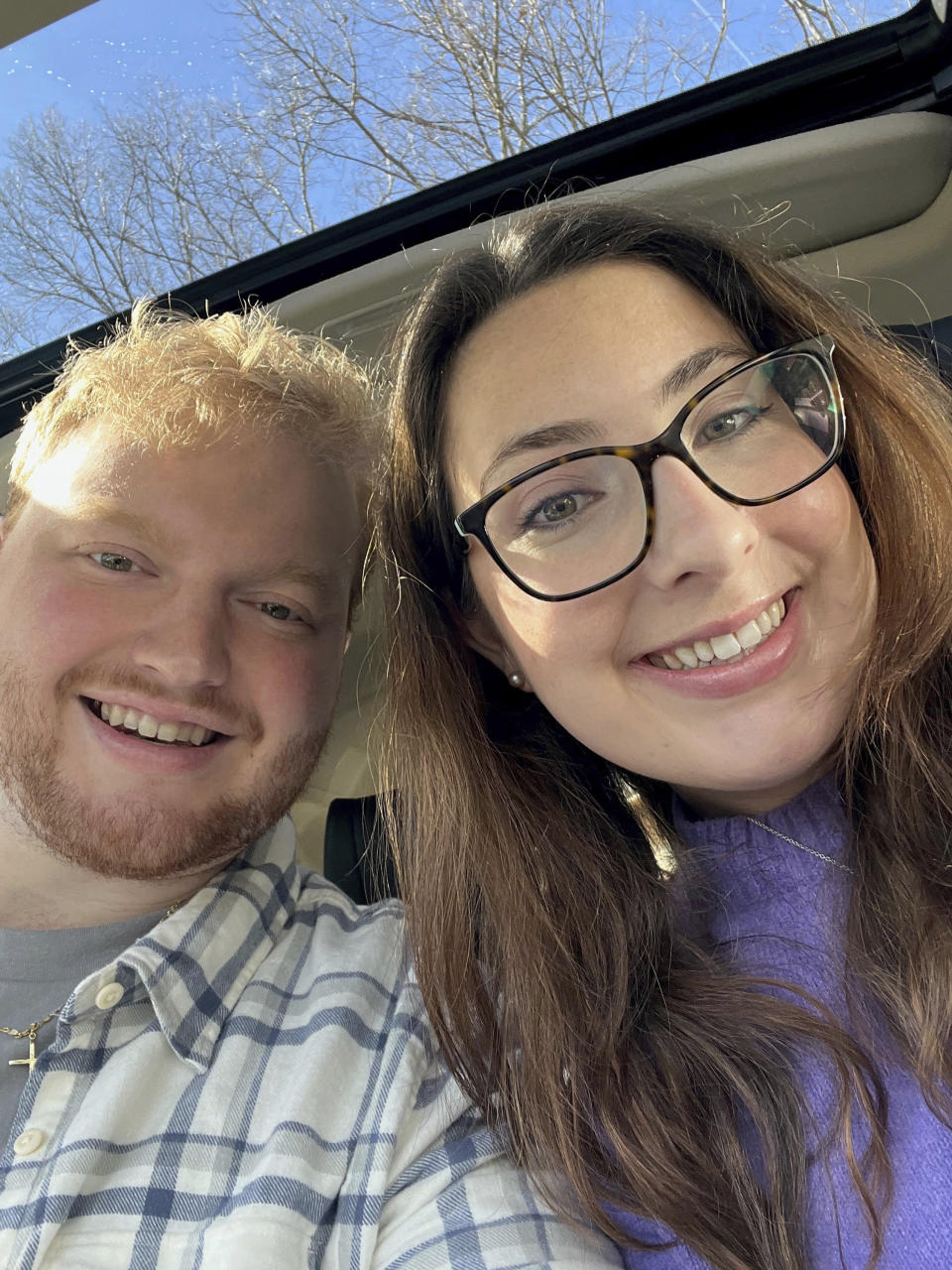 This March 31, 2024 image provided by Shelby Merrill shows Paul Armstrong and Shelby Merrill in Tyngsborough, Mass. The two met in college through the Marriage Pact, a popular ritual that students around the country participate in each year. (Shelby Merrill via AP)