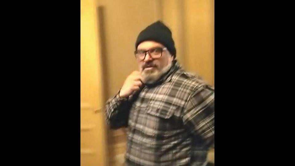 A federal court affidavit says this video still was Proud Boys member Joseph Biggs as he said, “This is awesome!” while invading the U.S. Capitol on Jan. 6