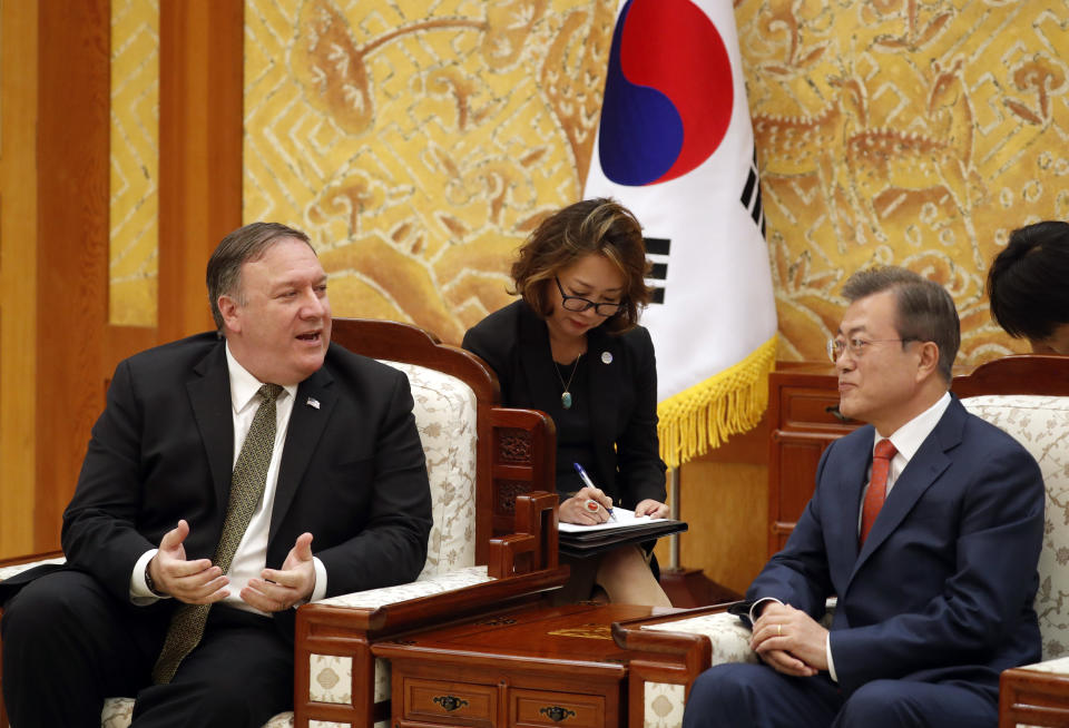 U.S. Secretary of State Mike Pompeo talks with South Korean President Moon Jae-in during their meeting at the presidential Blue House in Seoul, South Korea, Sunday, Oct. 7, 2018. (Kim Hong-ji/Pool Photo via AP)
