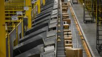 Packages move along a conveyor belt at an Amazon Fulfillment center on Cyber Monday in Robbinsville, New Jersey, in November 2022. - Stephanie Keith/Bloomberg/Getty Images