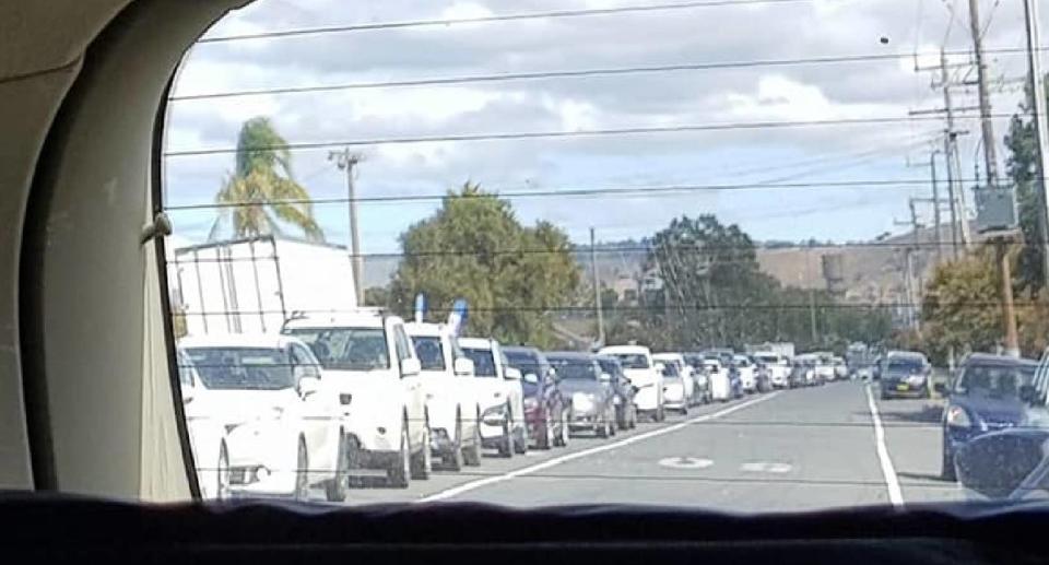 Cars lined up down street