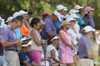 Fans watch Lexi Thompson on the seventh green during the first round of the U.S. Women's Open golf tournament at the Pine Needles Lodge & Golf Club in Southern Pines, N.C. on Thursday, June 2, 2022. (AP Photo/Steve Helber)